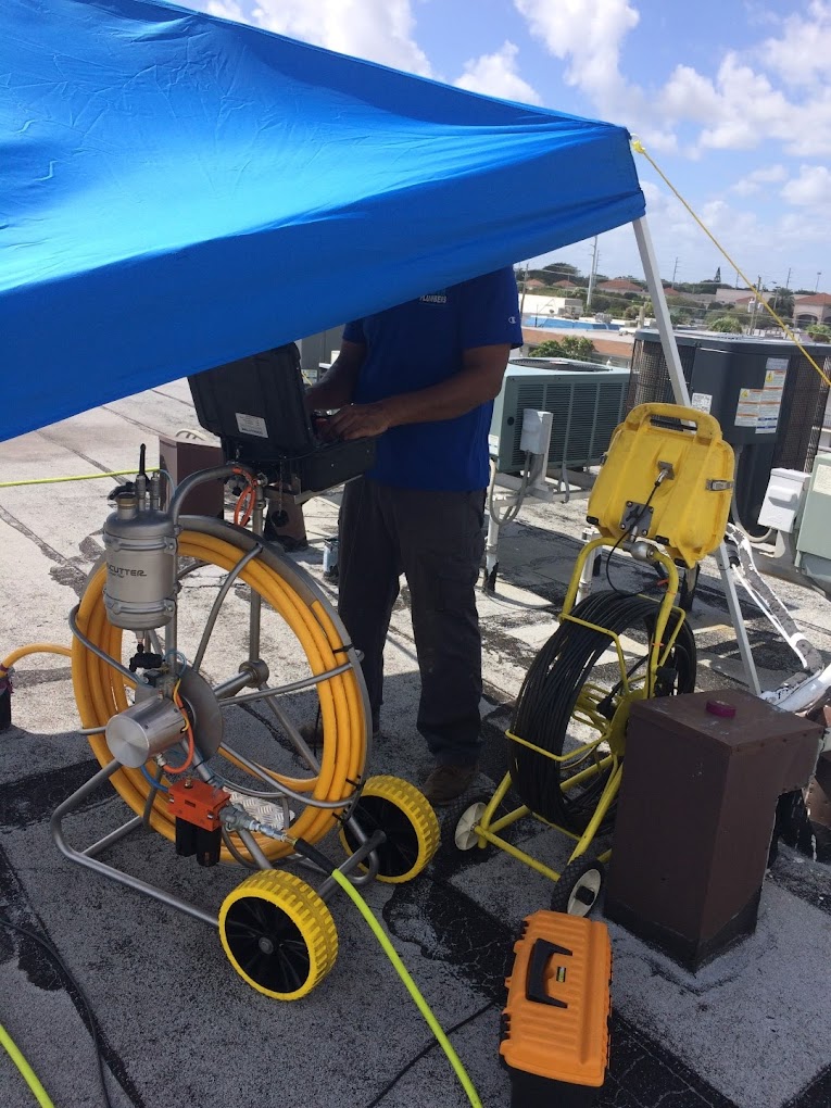 Kwik Plumber Inspecting Sewer Pipe Kwik Plumber Inspecting Sewer Pipe Jupiter, FL