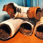 Old, rusty cast iron pipes